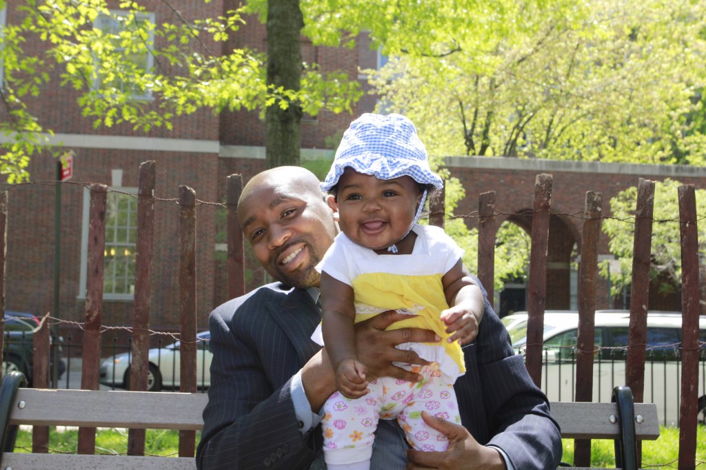 Fredy Mfuko with daughter Zuri